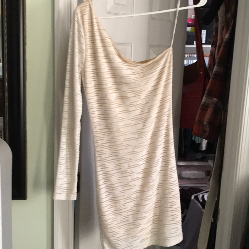 Cream colored one sleeved mini dress
